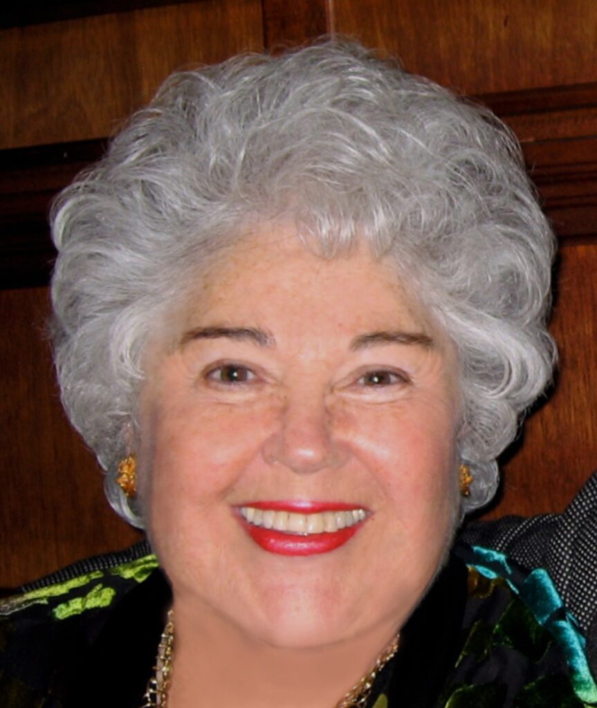 Judith Skutch Whitson, smiling.