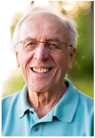 Steve Weglarz Sr., smiling, outdoors in the sun.